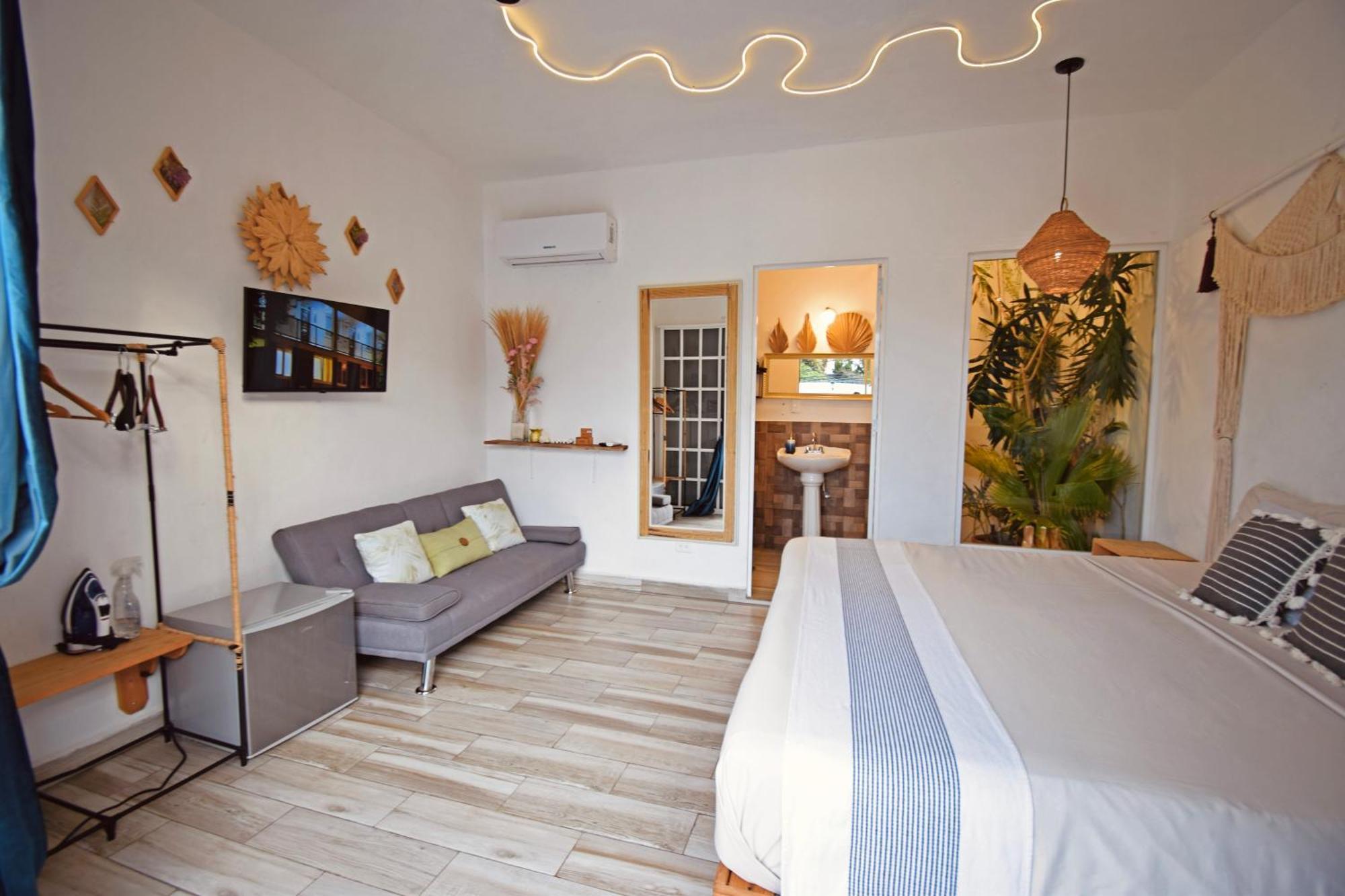 Tropical Bedroom -casa Nomis Habitación en casa particular Cancún
