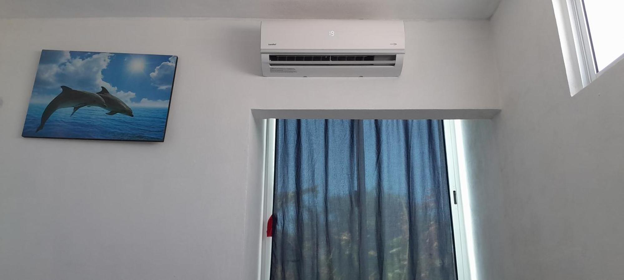 Con Bano A 10 Minutos Del Aeropuerto Y Tren Maya Habitación en casa particular