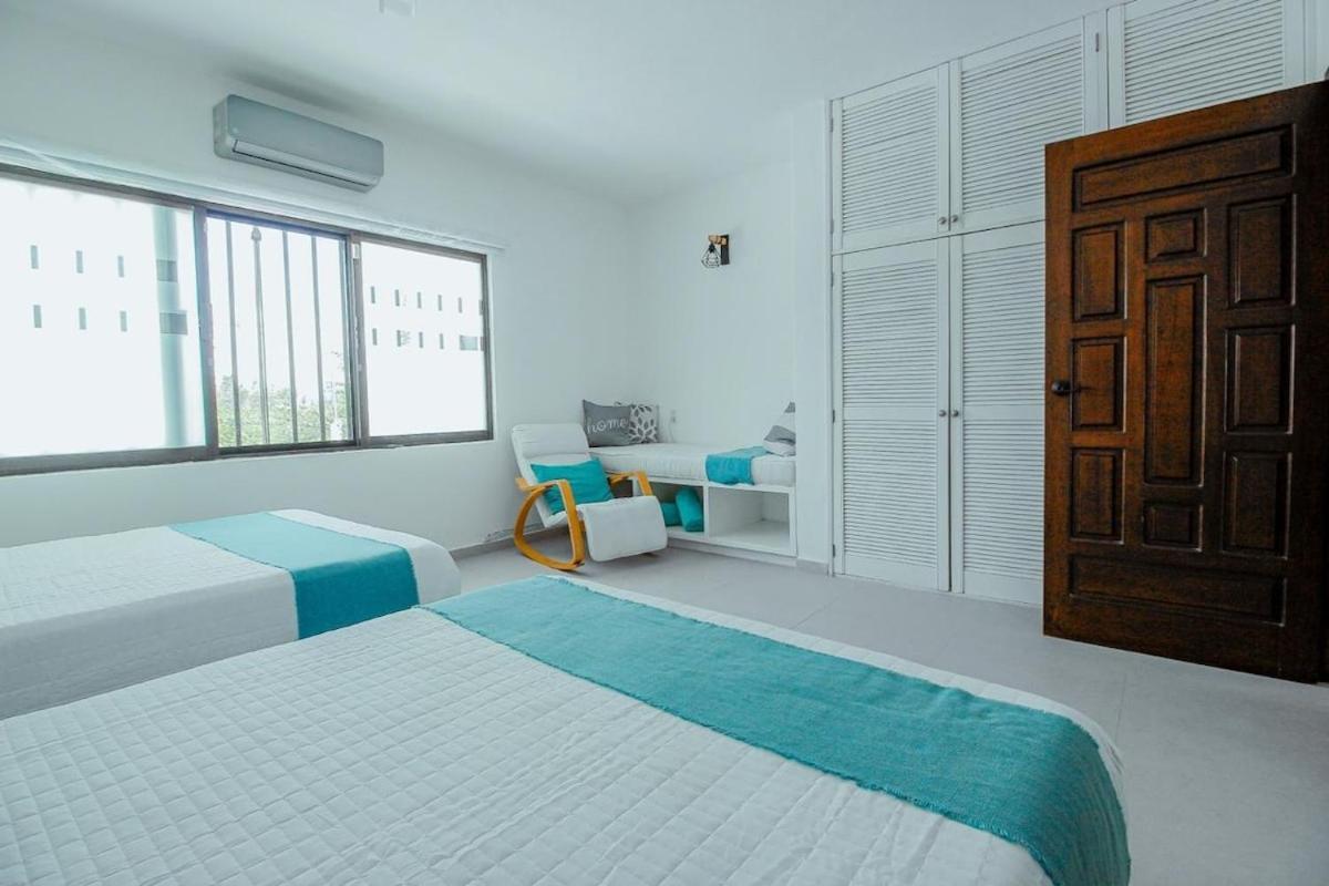 Сasa de vacaciones Oceanfront Private Pier Pool Garden Terrace 3br House Cancún